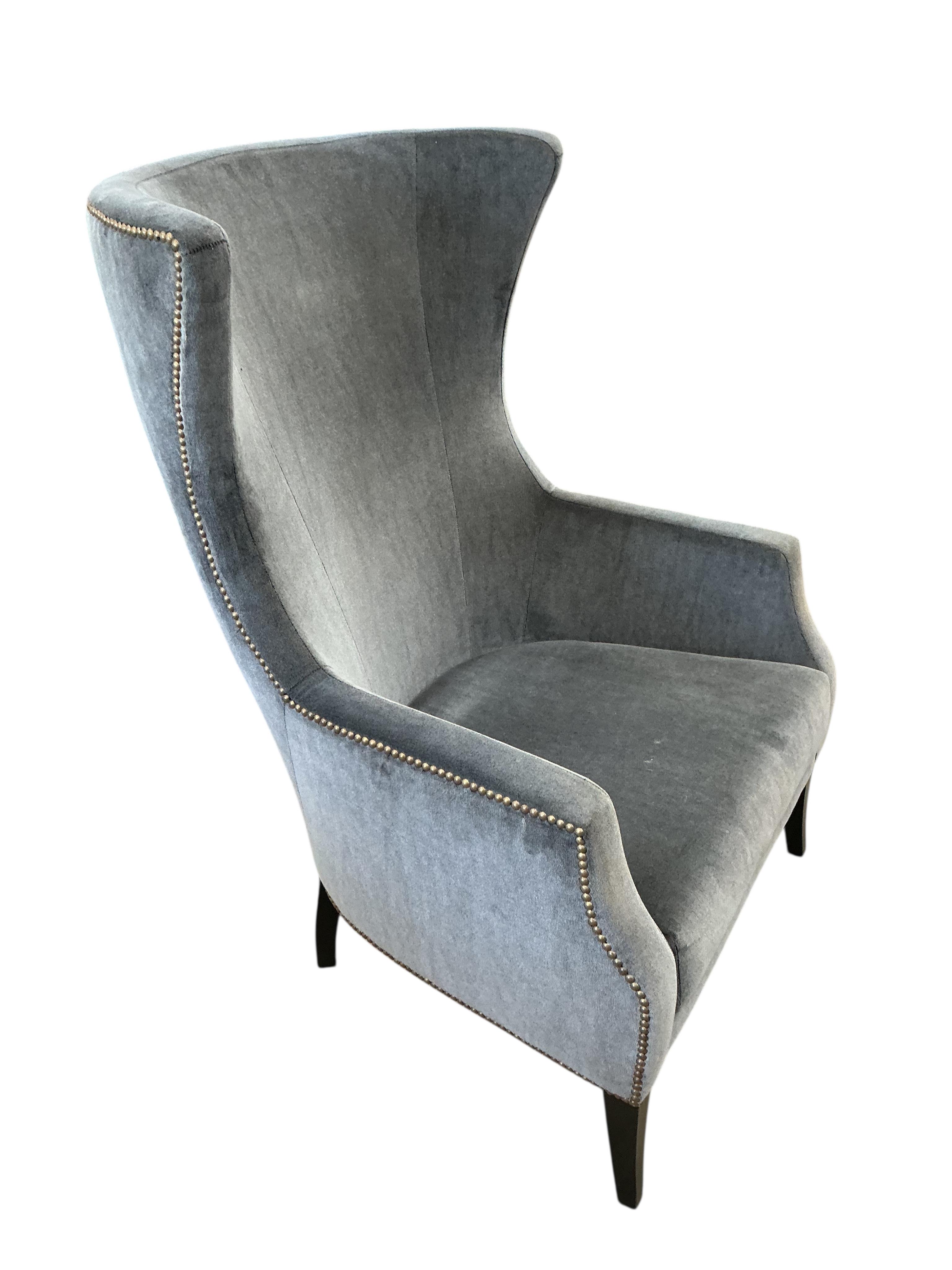 A Contemporary upholstered armchair, width 70cm, depth 72cm, height 110cm